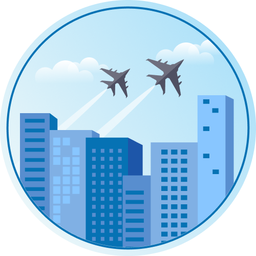 Planes flying over buildings